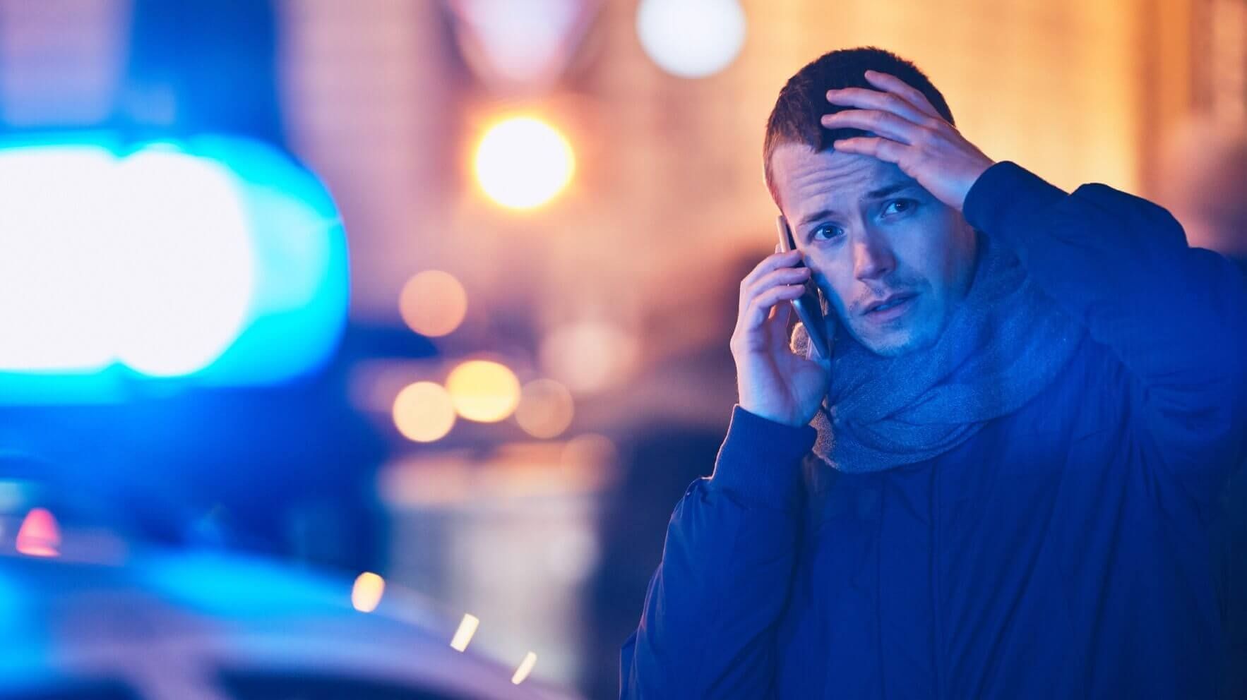 Man using E911 VoIP feature