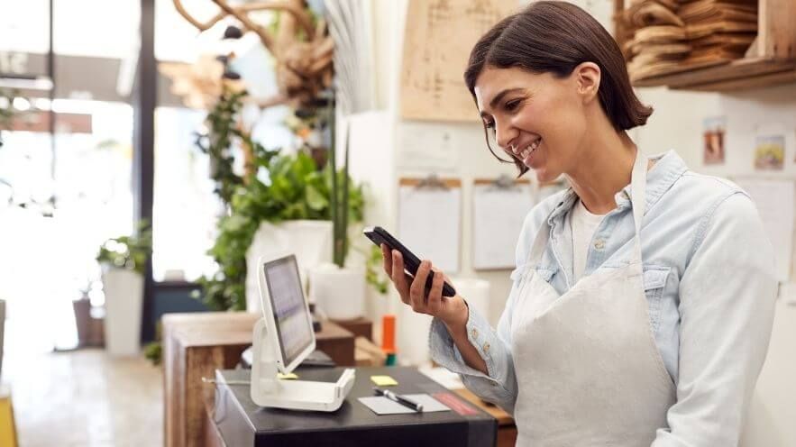 Business owner using SMS sales funnel